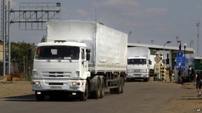 First trucks pass the border post at Izvaryne, eastern Ukraine