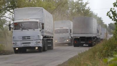 Russian aid trucks on the main road to Luhansk