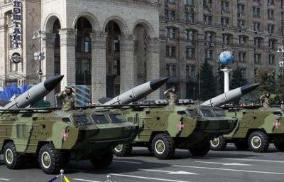 Soldiers salute during Ukraine's Independence Day military parade