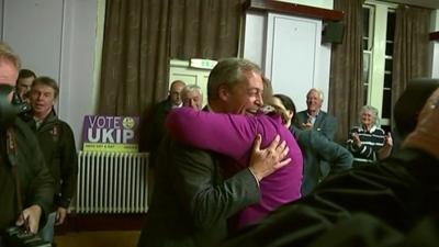 Nigel Farage celebrating with another UKIP supporter