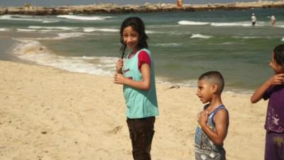 Children on a beach in Gaza