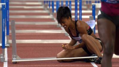 Queen Harrison of the United States after falling in the 100m hurdles at the Diamond League meeting in Zurich