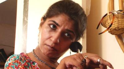 Divya Arora doing her makeup