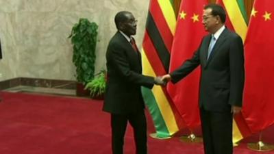 Presidents Robert Mugabe and Xi Jinping