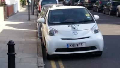 Car on double yellow line