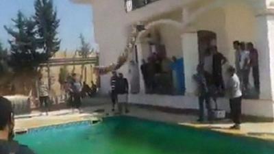 Man jumps into pool