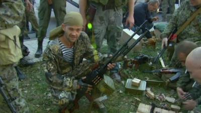 Pro-Russian separatist holding a weapon