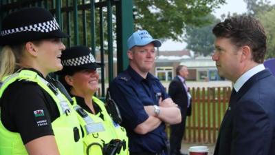 Police chat with US ambassador to the UK, Matthew Barzun, at the Nato Summit in Wales, September 2014