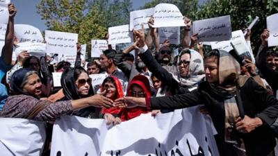 Women protesting during a rally against the gang-rape incident