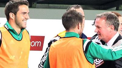 Northern Ireland manager Michael O'Neill celebrates after the final whistle in Budapest