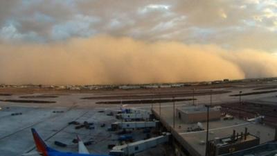 A dust storm approaches Phoenix airport