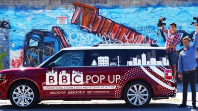 BBC journalists Matt Danzico and Benjamin Zand with the BBC Pop Up car