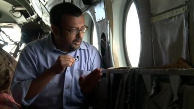 Sanjoy Majumder on board an Indian helicopter flying aid to Kashmir flood areas