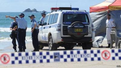 Australian police inspect beach at Byron Bay