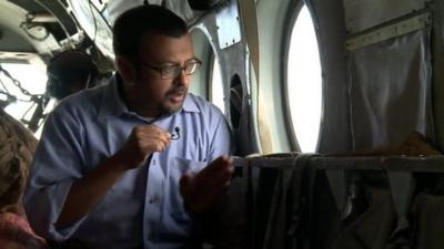 Sanjoy Majumder on board an Indian helicopter flying aid to Kashmir flood areas