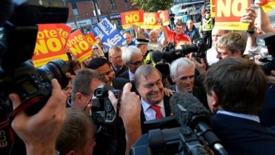 Crowd surrounding John Prescott