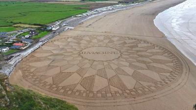 Sand art by Simon Beck at Brean Beach, Somerset