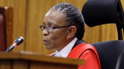 Judge Masipa reads her verdict during the trial of Olympic and Paralympic track star Pistorius at the North Gauteng High Court in Pretoria