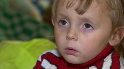 Close up of Ukrainian child in bomb shelter