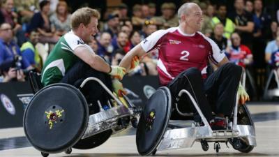 Prince Harry and Mike Tindall playing wheelchair rugby