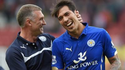 Leicester manager Nigel Pearson jokes with Leonardo Ulloa