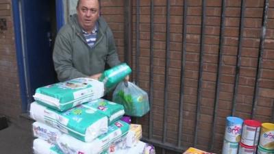 Alan Henning packing for a convoy