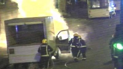 CCTV footage showing firefighters tackling pavement explosion