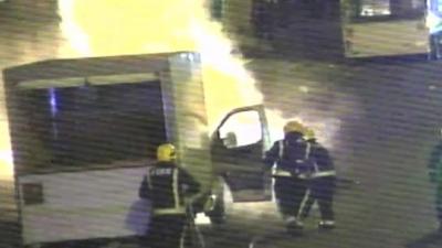 CCTV footage showing firefighters tackling pavement explosion