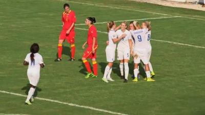 England's women celebrate during their 10-0 victory away in Montenegro.