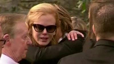 Nicole Kidman is comforted by her husband Keith Urban