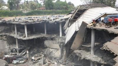 Remains of cars and other debris can be seen of the parking lot outside the Westgate mall in Nairobi, Kenya - 26 September 2013