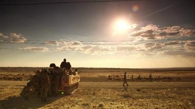 A tank on the Turkish side of the border with Syria