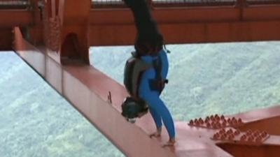Base jumper on bridge