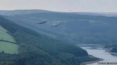 Two Lancasters flying over Derwent reservoir