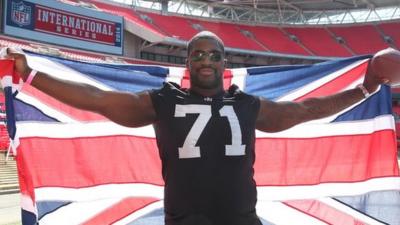 Manchester born Menelik Watson plays for the Oakland Raiders in the NFL