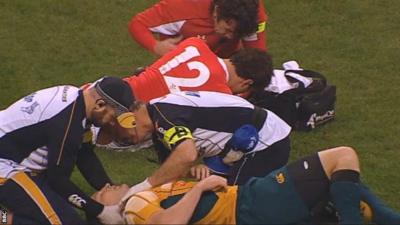 Jamie Roberts is treated on the pitch