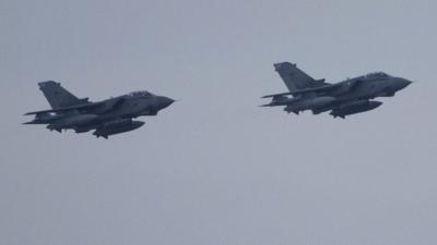 RAF Tornado GR4 fighter jets prepare to land at the Akrotiri British airbase, near the Cypriot port city of Limassol