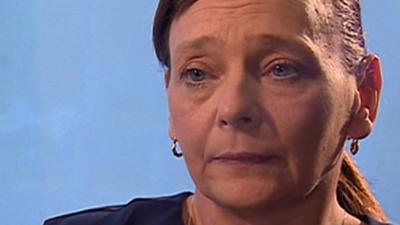 Close up of Barbara Henning making appeal for release of her husband, Alan