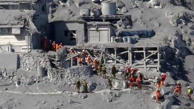 Rescue Workers on Mount Otake in Japan