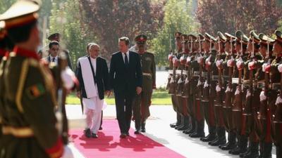 Prime Minister David Cameron is welcomed by Afghanistan's President Ashraf Ghani