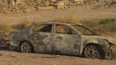 Badly burnt out car