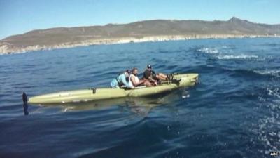 Kayakers filmed from rescue boat