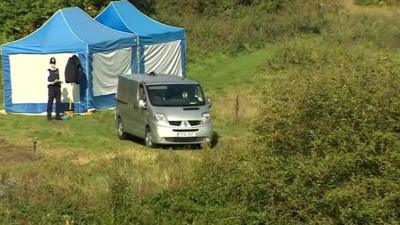 The body is taken away from Boston Manor Park