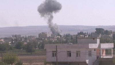 Smoke rising above town