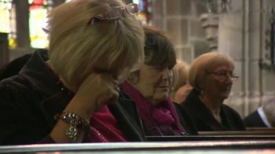 Mourners at church