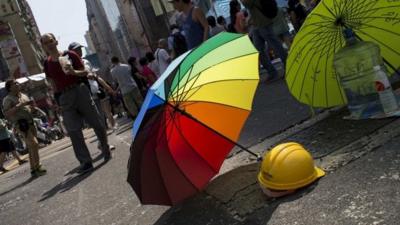 Umbrella and helmet in Hong Kong