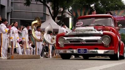 mariachi band and classic car