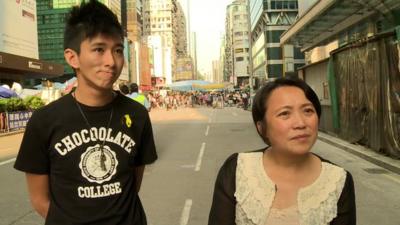 Hong Kong pro-democracy protester, Daniel Wong, and Josephine Chan who does not support the protests