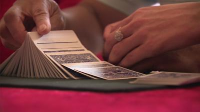 Hands of a stroke survivor learning a magic trick