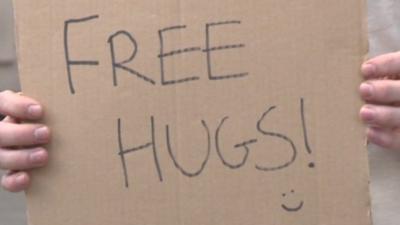 Sign saying Free Hugs